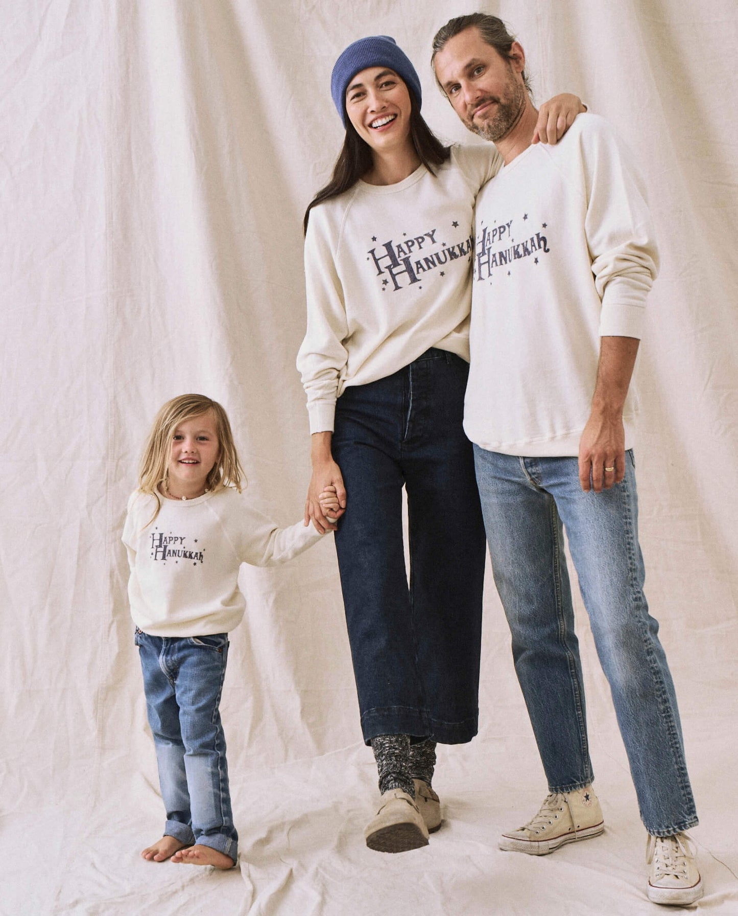 The Little College Sweatshirt. -- Washed White with Hanukkah Graphic