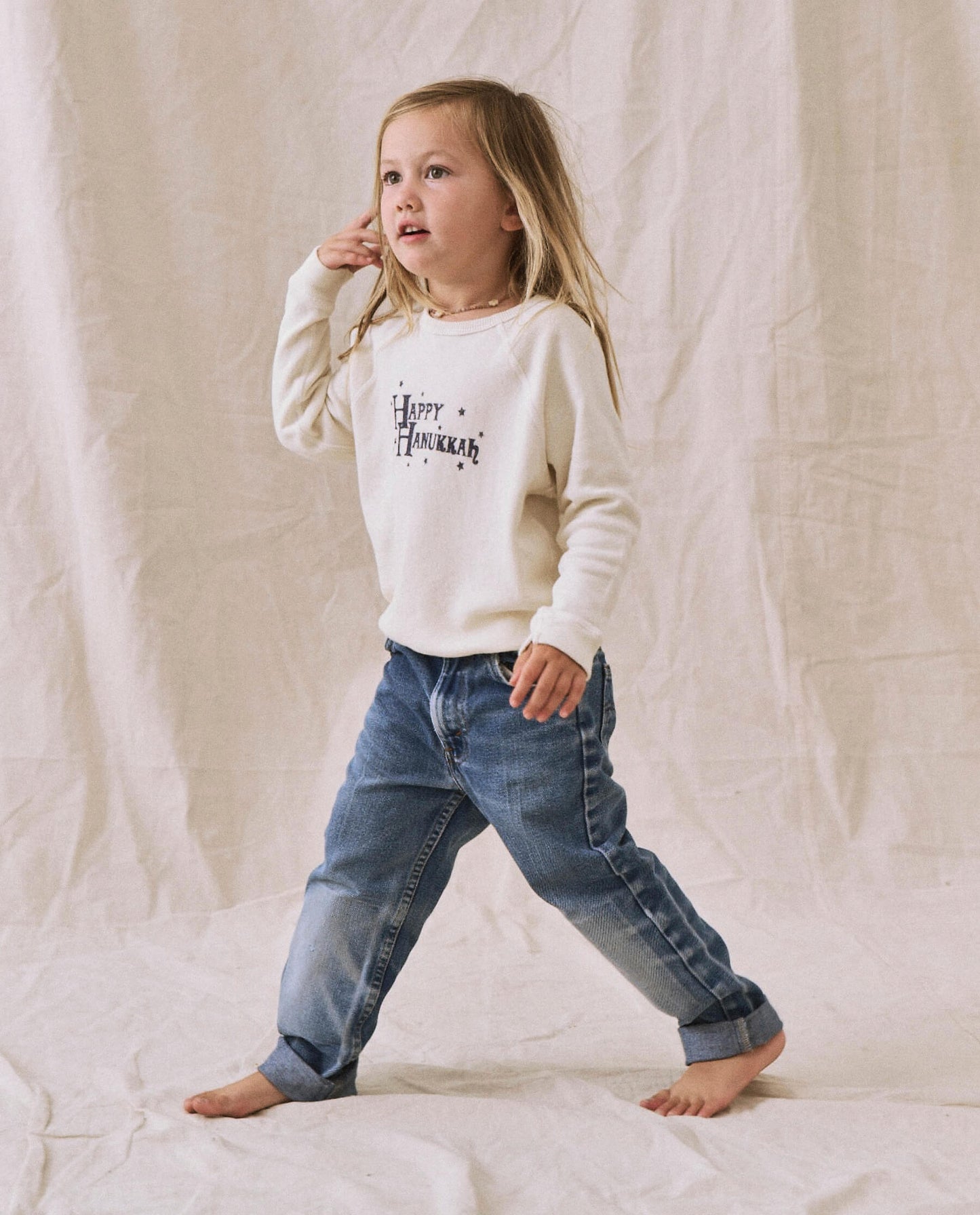 The Little College Sweatshirt. -- Washed White with Hanukkah Graphic